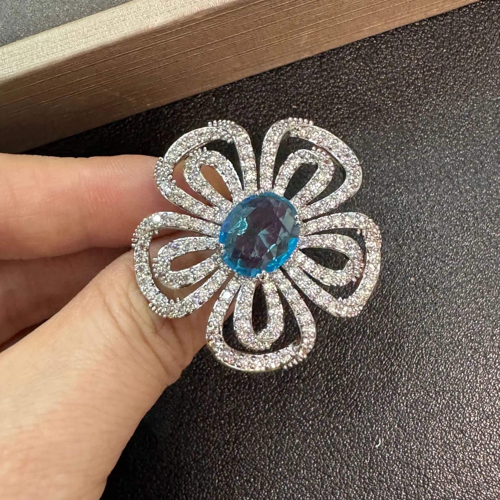 

Hollow Flower open ring with Blue CZ Center Stone Full Paved Cubic Zirconia Statement ring for Women silver color jewelry party