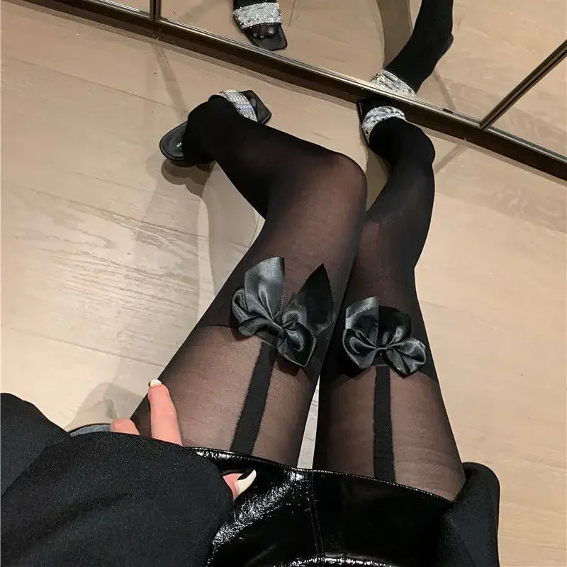 ผู้หญิงเซ็กซี่ Pantyhose Tights Bowknot Lolita ถุงน่องไนลอนไม่มีรอยต่อ Fishnet Pantyhose หญิงร้านขายชุดชั้นในสไตล์ญี่ปุ่นสีดํา