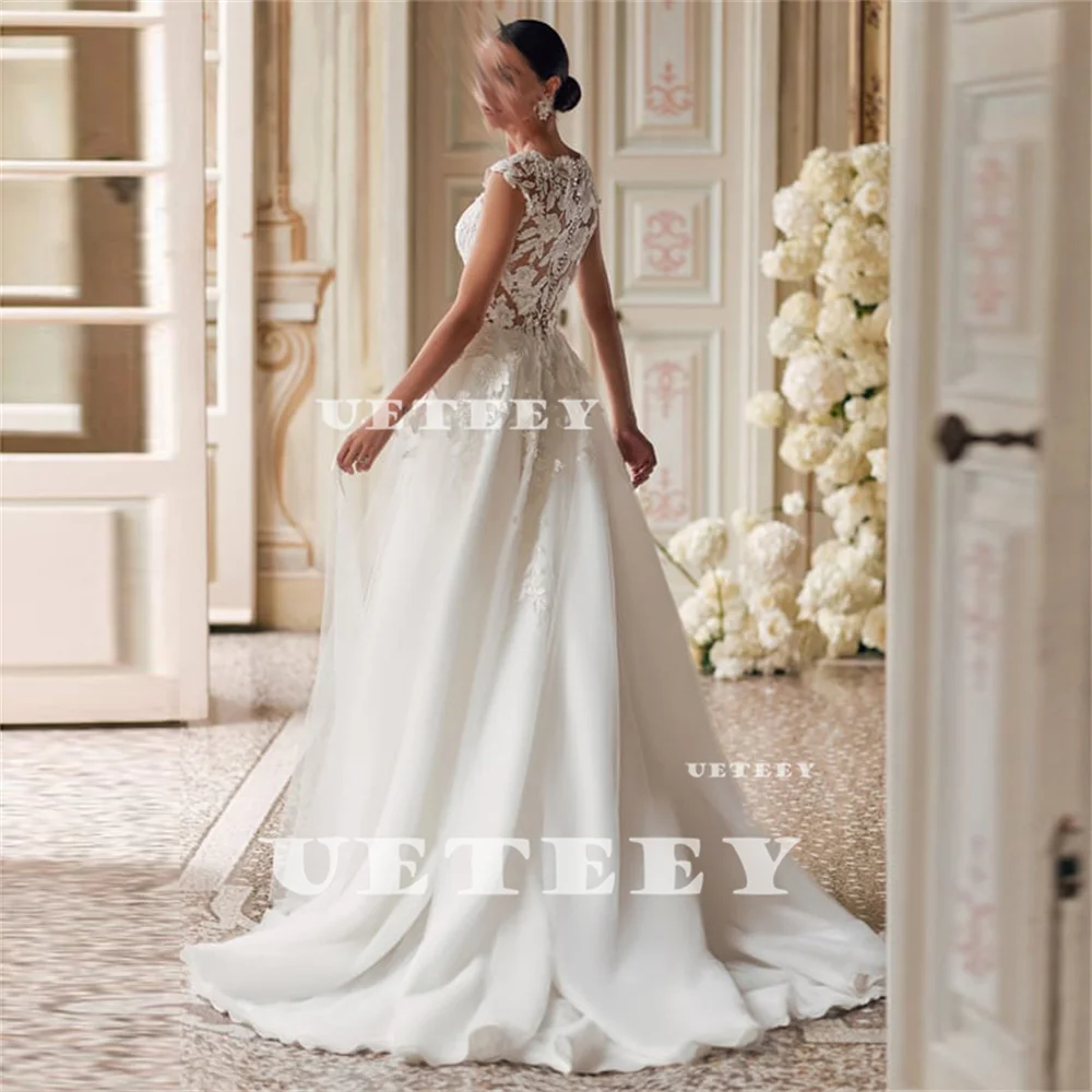 UETEEY Customized Appliques V Neck Cap Sleeve Tulle A Line Wedding Dress Illusion Zipper Back Court Train Bridal Gown