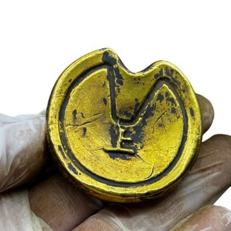 Horseshoe , ancient bars, coins, ingots, gold bricks, golden brass ornaments, decorative pieces, film props