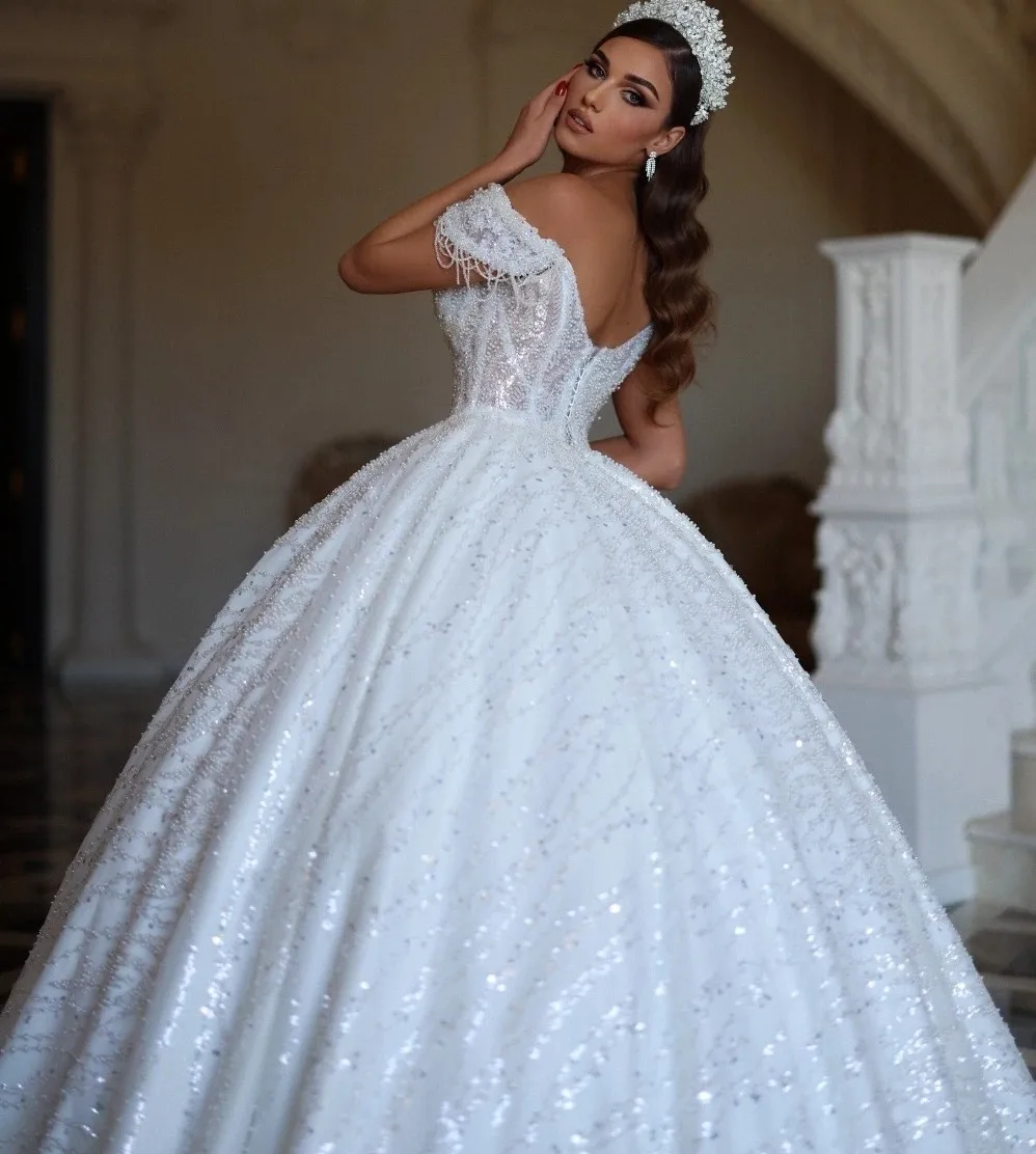 2025 Abito da sposa con paillettes di lusso con spalle scoperte Perline Appliques Abito da ballo Abiti da sposa Abiti da Noiva personalizzati