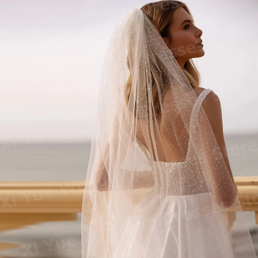 반짝 이는 라인 여성 웨딩 드레스 스파게티 스트랩 Vestidos De Novia 신부 가운 맞춤형 민소매 새틴 Hochzeitskleid