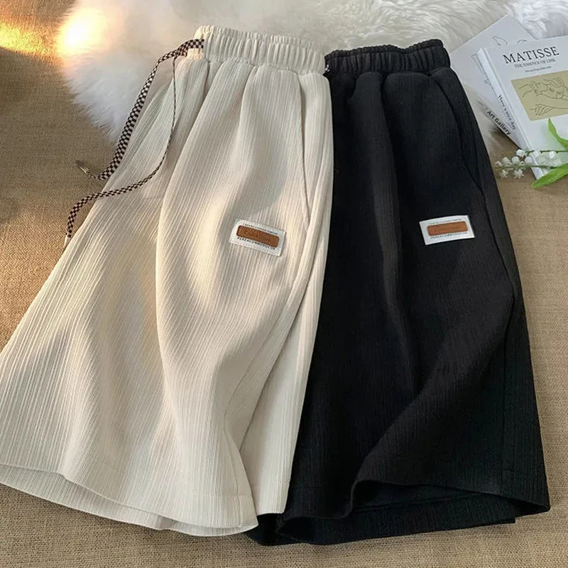 Pantaloncini da motociclista per donna Trend pantaloncini comodi in seta di ghiaccio tasche elastiche Casual pantaloncini larghi da donna a vita