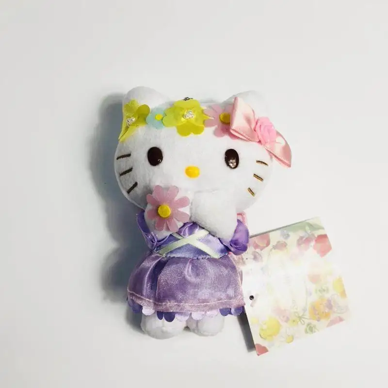 Pluszowy breloczek Hello Kitty Cinnamoroll z serii Flower Fairy, urocza kreskówkowa puszysta zabawka, zawieszka do kluczy, dekoracja do plecaka lub na zamek błyskawiczny.