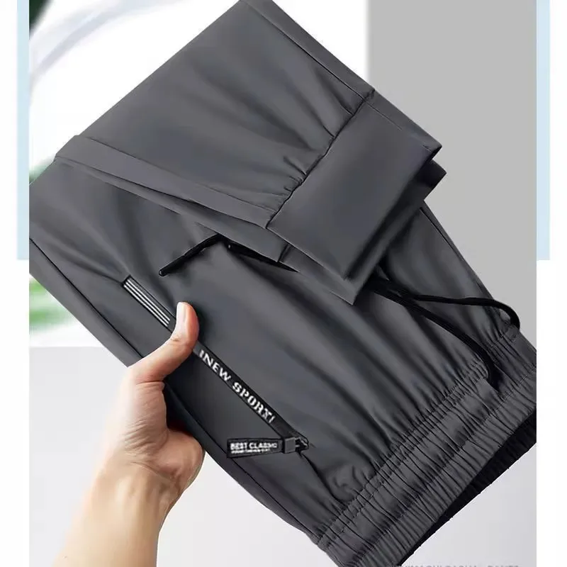 ใหม่ 2025 ชายผ้าไหมน้ําแข็ง Cool Feeling หลวมสบายๆกางเกงยาวกางเกงทํางานบางพร้อมซิป Kets สําหรับทํางาน