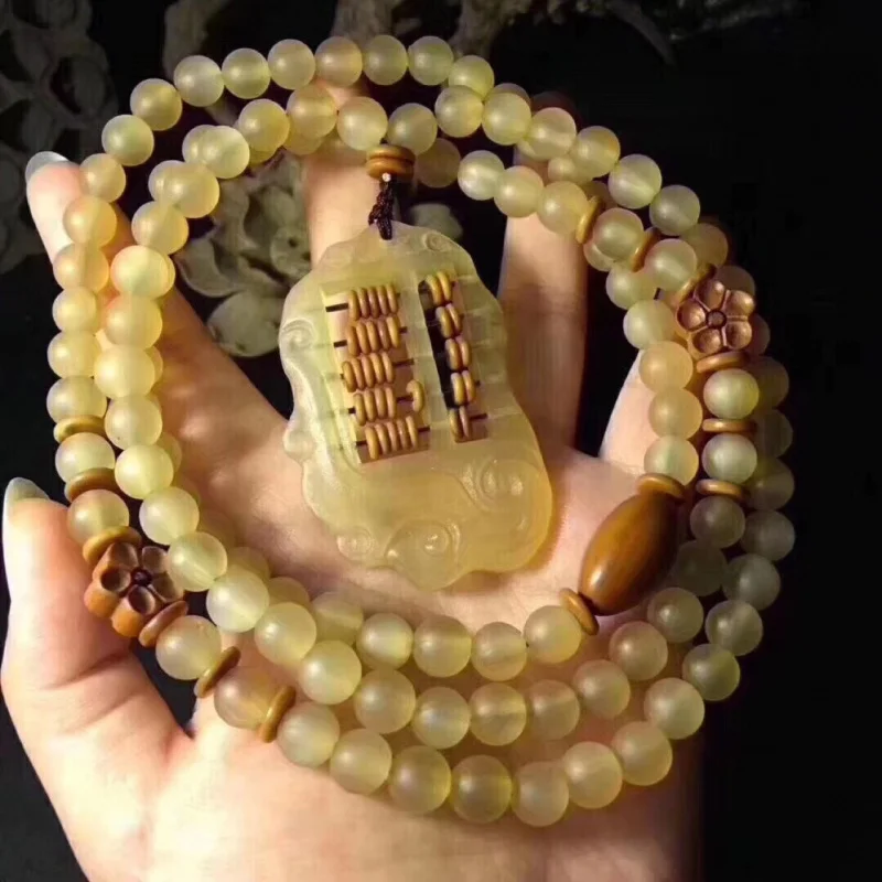 natural Tibetan bead bracelet is -crafted and pairs well with the peach wood plum blossom horn abacus