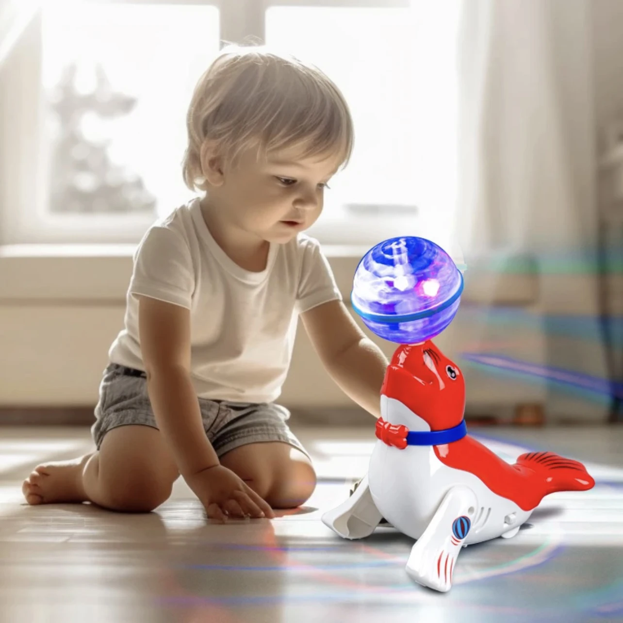 Lindo león marino Top Ball juguete eléctrico para niños con trombos acrobáticos sonido colorido y luz regalo perfecto para bebés