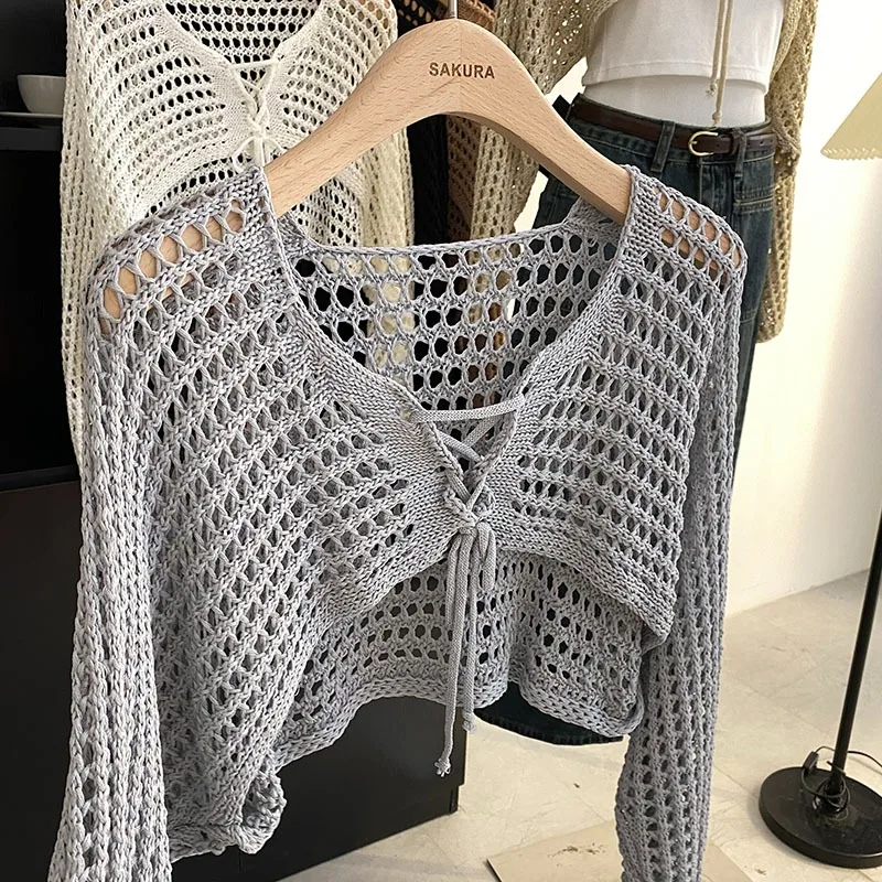 Cardigan corto all'uncinetto con cravatta sul davanti da donna a maniche lunghe Sheer OpenKnit Bolero Coprispalle Top Summer Beach Bikini Cover Up Y2K Outfit