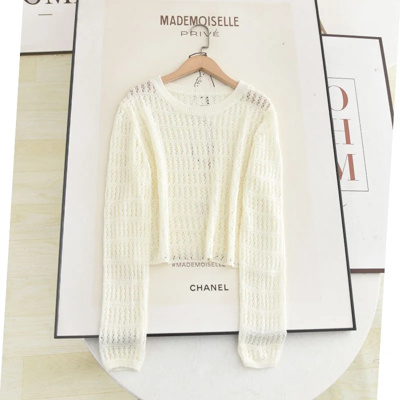 

Весна-лето 2025: Новинка! Женский тонкий вязаный топ с круглым вырезом и ажурными элементами, универсальный, дышащий, комфортный, цвет молочный белый.