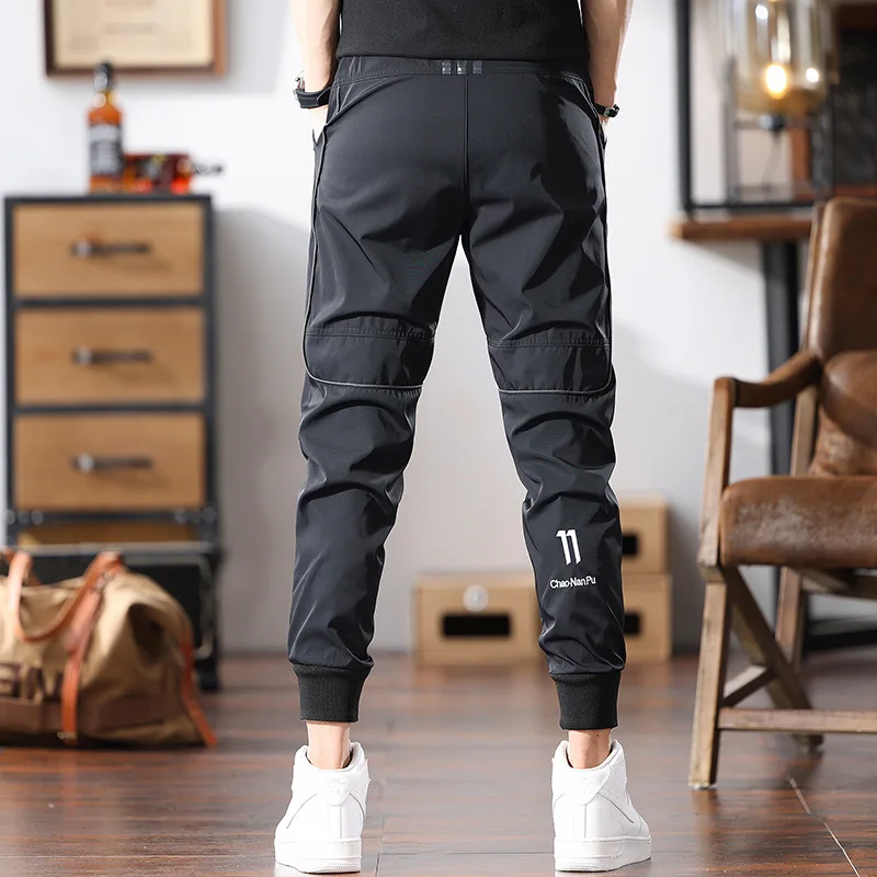

Sports pants men's summer ultra-thin ice silk breathable slim fit elastic small foot nine minute quick drying pants