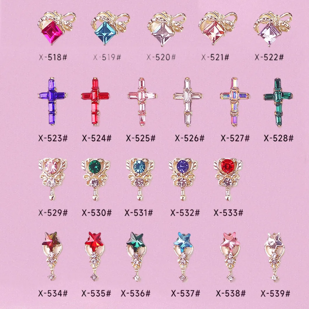 ชุดอุปกรณ์ตกแต่งเล็บ 22 ชิ้น ประดับด้วยอัญมณีหลากสีสัน รูปดาว/กากบาทสีทอง 3 มิติ สำหรับตกแต่งเล็บสไตล์สาวหวาน พร้อมจี้ห้อยและเพชรปลอม