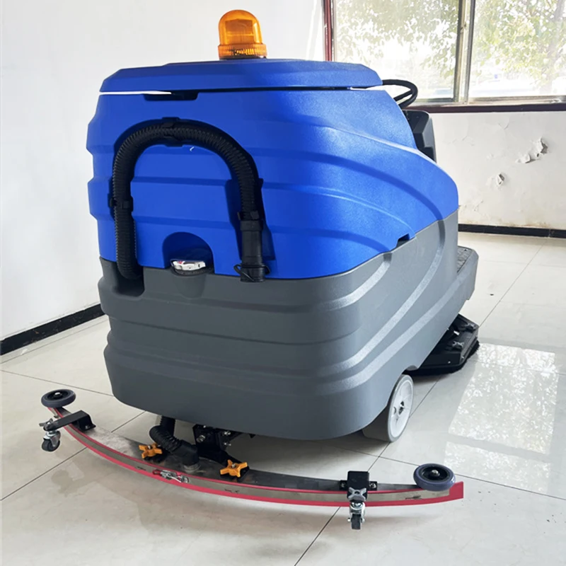Macchina industriale per asciugatrice per pavimenti Ride-On per la pulizia della superficie del calcestruzzo della macchina per la pulizia del pavimento di grandi magazzini