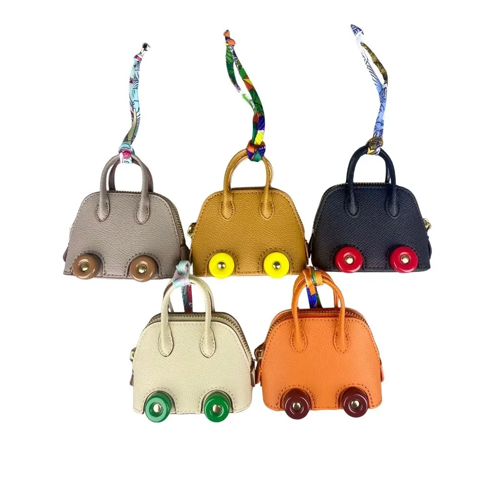 Mini-Taschenanhänger aus Leder mit niedlichen Rädern – Kopfhörer- und Lippenstiftbeutel mit zwei Riemen – PU-Leder – ideal für Taschenzubehör – Detail 5