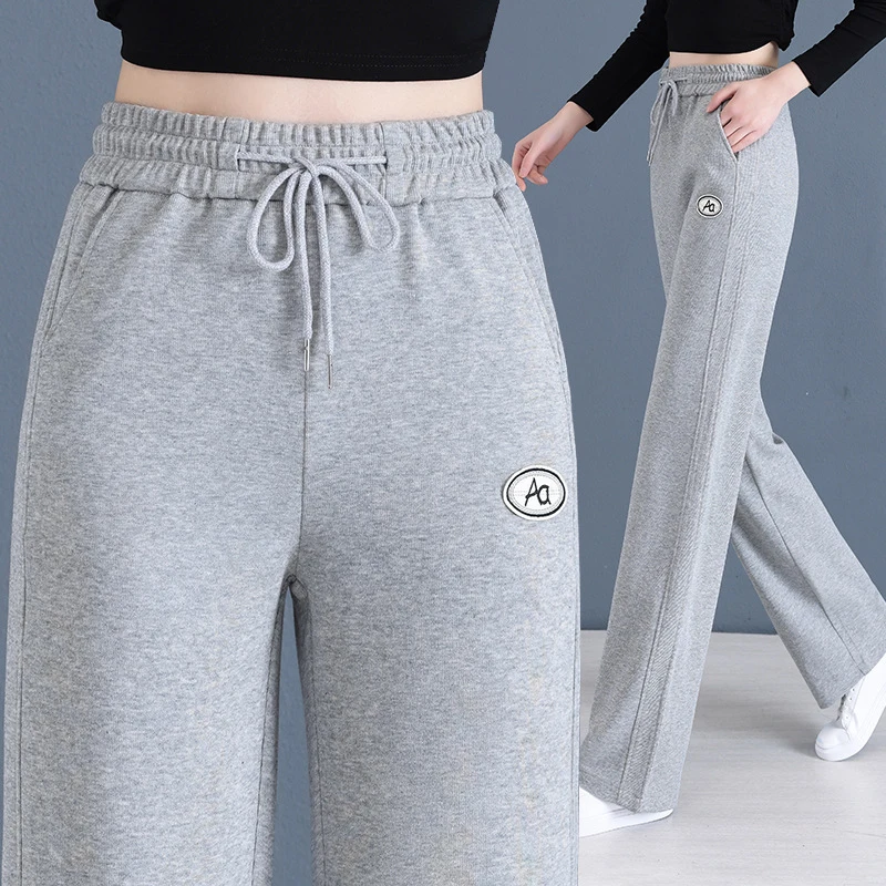 

Женские серые повседневные брюки прямого кроя с эластичным поясом, подходящие для активного отдыха, свободного кроя, весна-осень 2023.