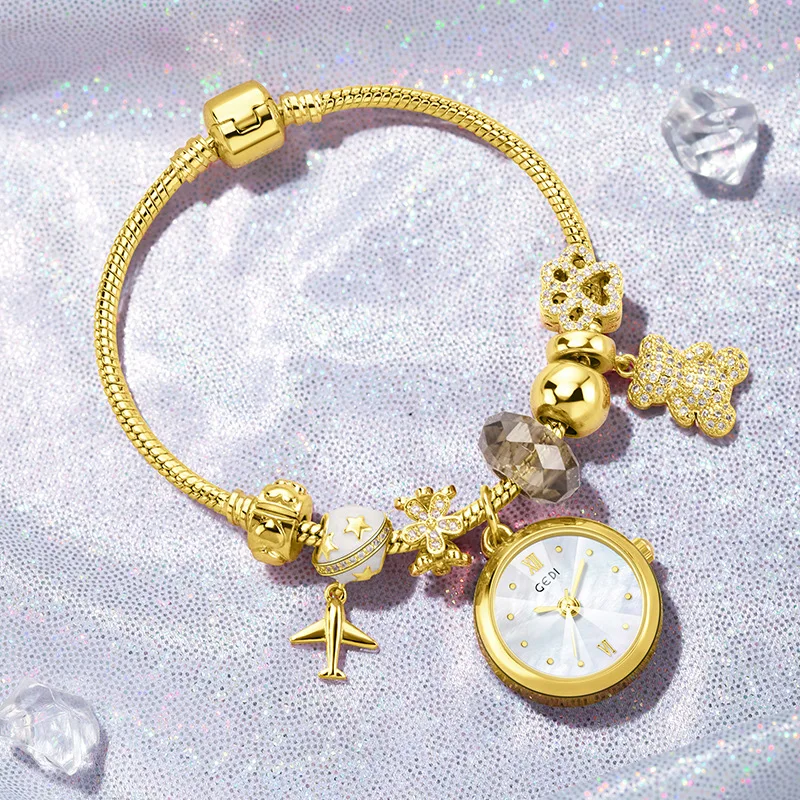 New Exquisite Gold Bracelet Watch Woman Light Luxury Brand High-end Cartoon Pendant Waterproof Female Fashion Clock Wristwatches