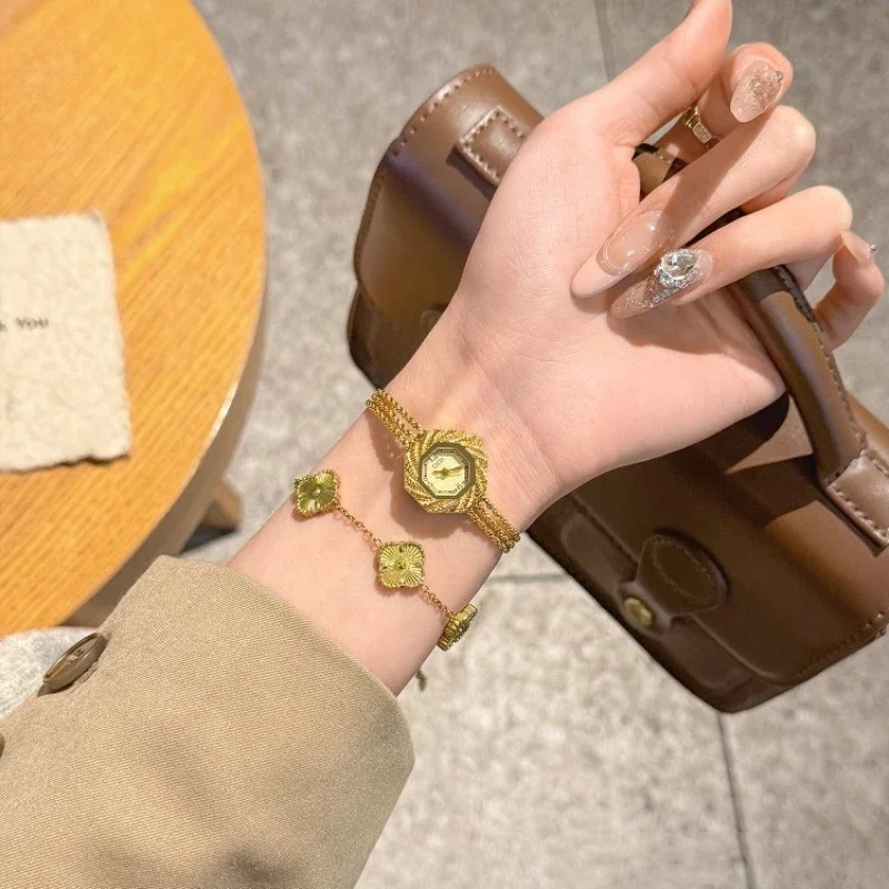 جديد خمر المرأة ساعات كوارتز فاخرة الراقية الذهب سلسلة السيدات ساعات يد شخصية الإبداعية المرأة ساعة مجوهرات