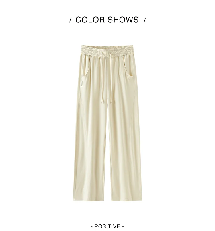 Damenhosen: Lässige, geschlitzte, lockere, geschwungene Slim-Fit-Hose im minimalistischen, vielseitigen Stil mit geschwungenem Bein – Sommermode 2026 für den Alltag – Detail 10