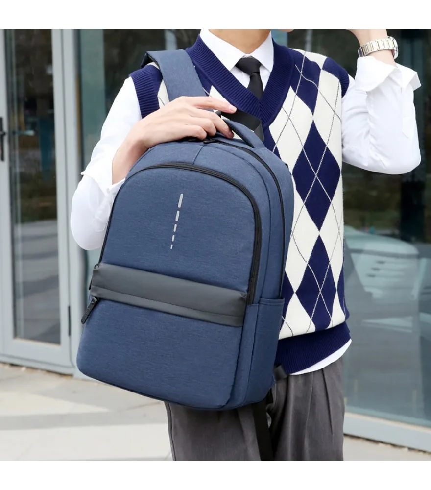 

Navy backpack with vertical reflective dot decor and dark gray bottom splicing anti splash dual mesh side pockets for student