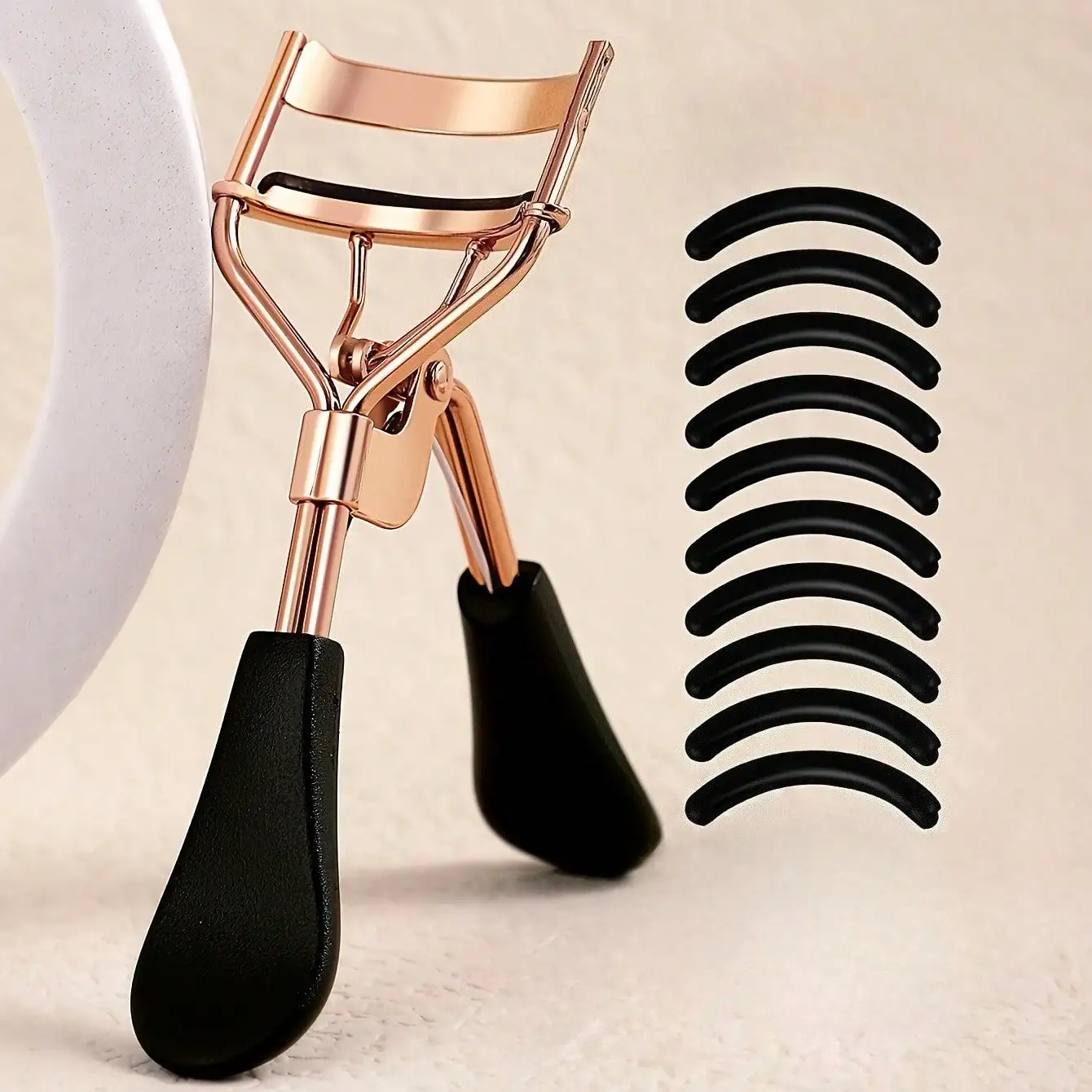 

Portable Eyelash Curler With 10 Silicone Pads, Stainless Steel Eyelash Curler That Won't Damage Lashes. A Tool To Lengthen And C