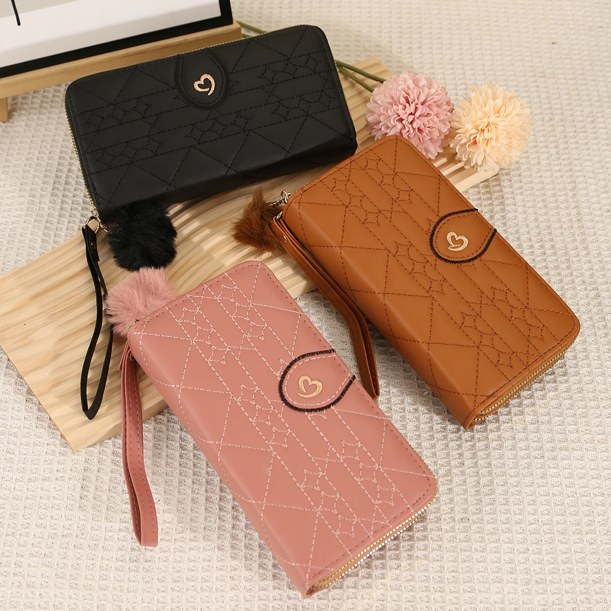 

Stylish, fresh and sweet, women's long mobile phone bag, double zipper wallet, clutch bag, cute hairball pendant.
