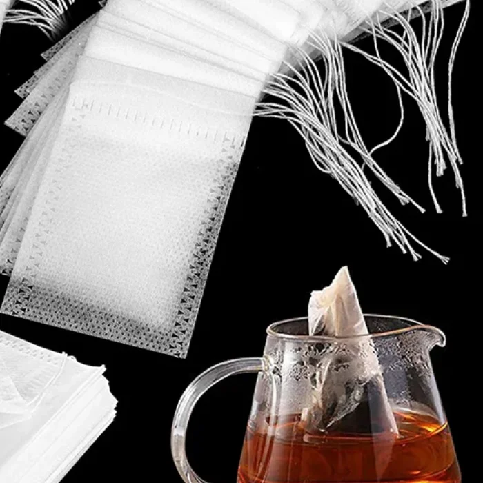 100 قطعة أكياس الشاي غير المنسوجة أكياس الشاي القابل للتصرف مع الرباط ختم القهوة التوابل الشاي ورق فلتر Infuser المطبخ Teaware #1