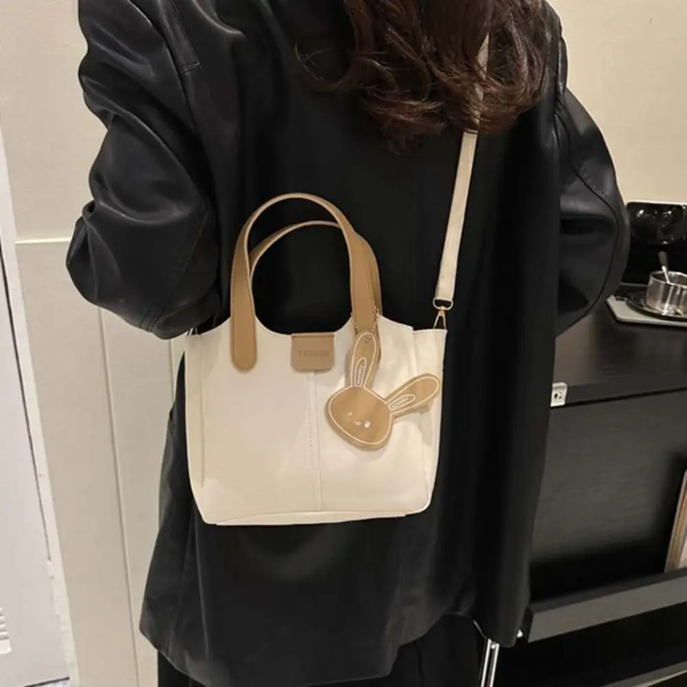 

Solid Color Rabbit Shoulder Bag with Pendant Square PU Leather Handbag Korean Style Large Capacity Bucket Crossbody Bag Girls