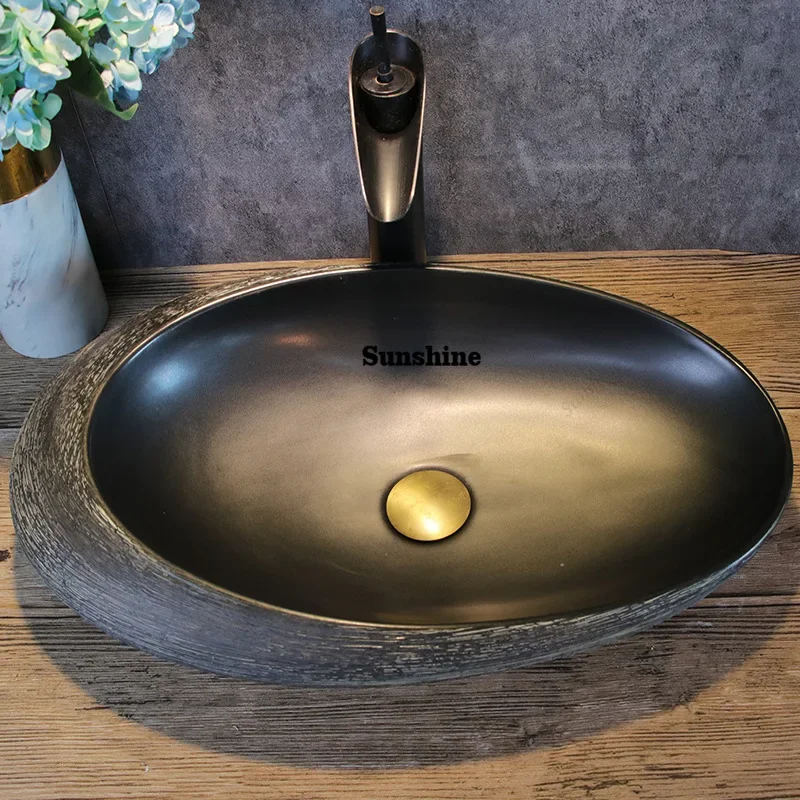

Artistic washbasin; oval wash basin; single basin for home use; bathroom wash basin; vintage ceramic wash basin.Y