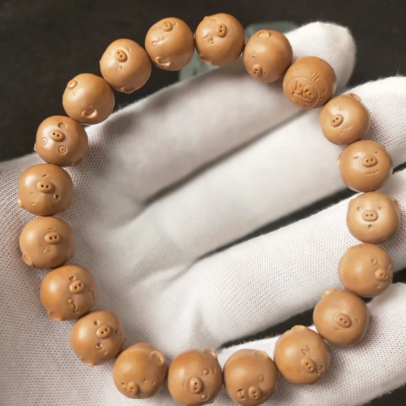 Hou Tou cute little , lucky , zodiac pig, hand bracelet, decorative item, walnut carving Buddha