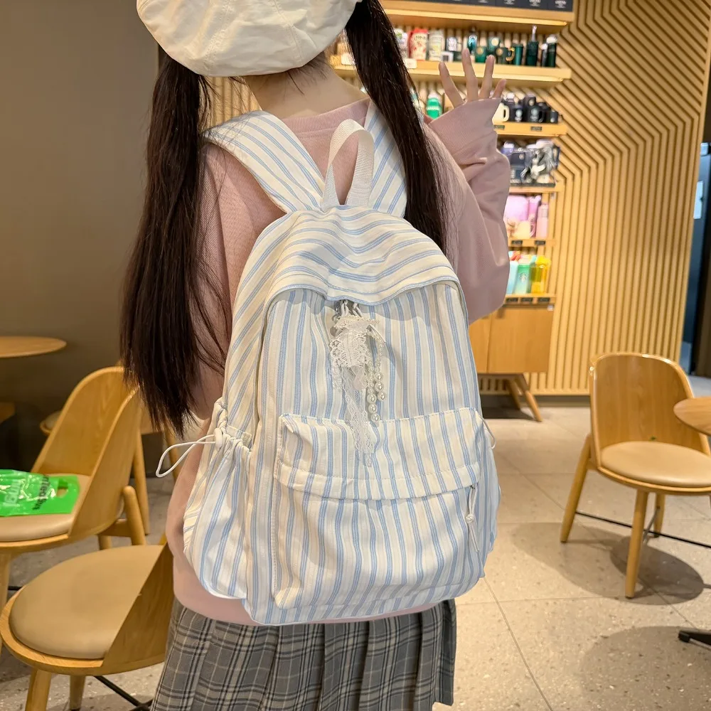 Light nylon cloth student schoolbag stripe collision color lovely bow pendant lady large capacity waterproof backpack