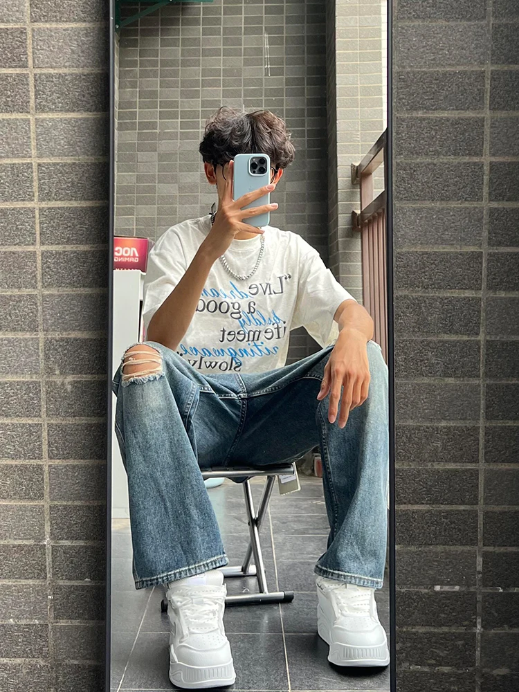 بنطلون جينز أزرق ممزق للرجال صيفي فضفاض مستقيم غير رسمي بنطلون طويل مغسول عتيق ملابس شبابية مقاومة للقطن والبوليستر