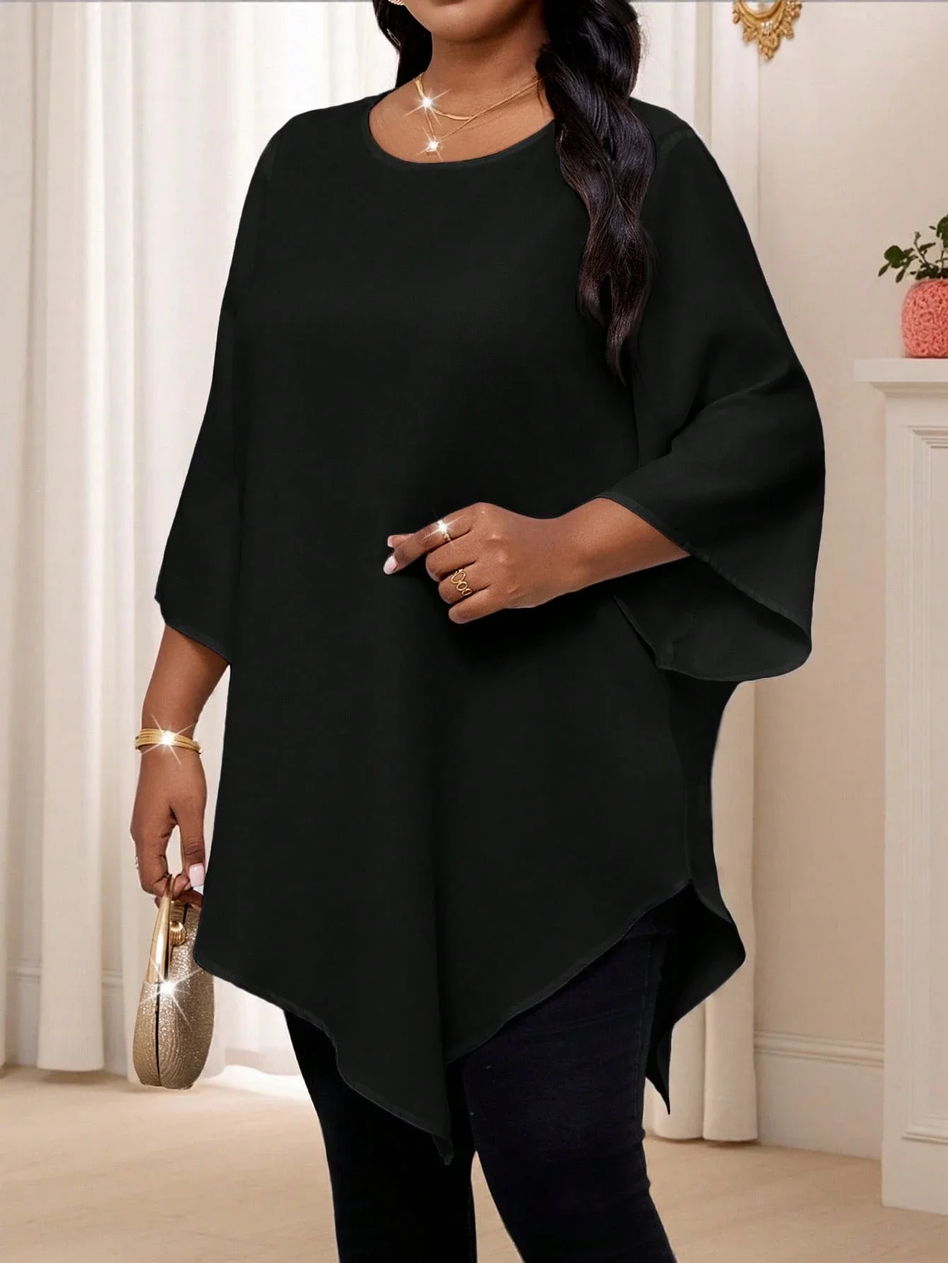 

Женская блузка больших размеров с круглым вырезом, рукавом 3/4 и асимметричным подолом