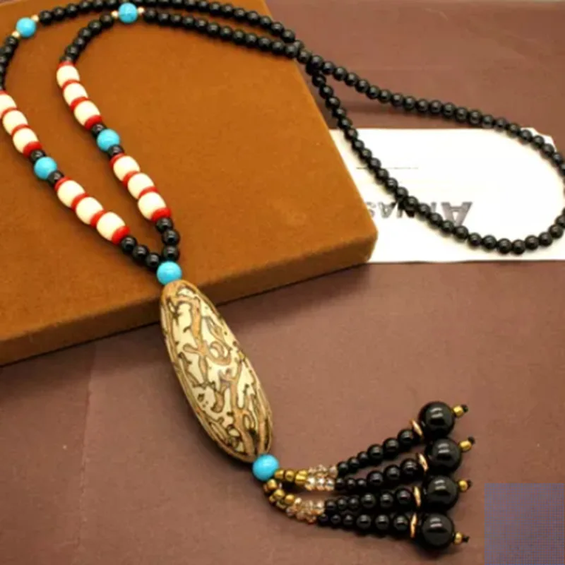 

Ethnic style retro sweater chain Thousand Eyes necklace, handmade long pendant, high-quality model, customized by manufacturer.