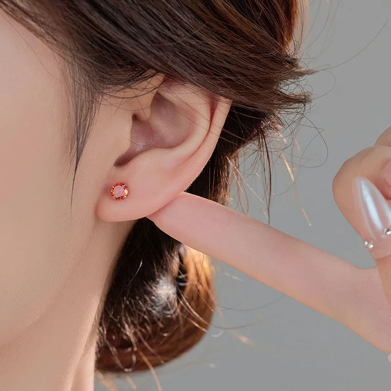 

Новые серебряные серьги-гвоздики S999 с камнями для женщин, подходящие для отверстий для ушей, универсальные аксессуары для ушей с четырьмя когтями и цветными бриллиантами.