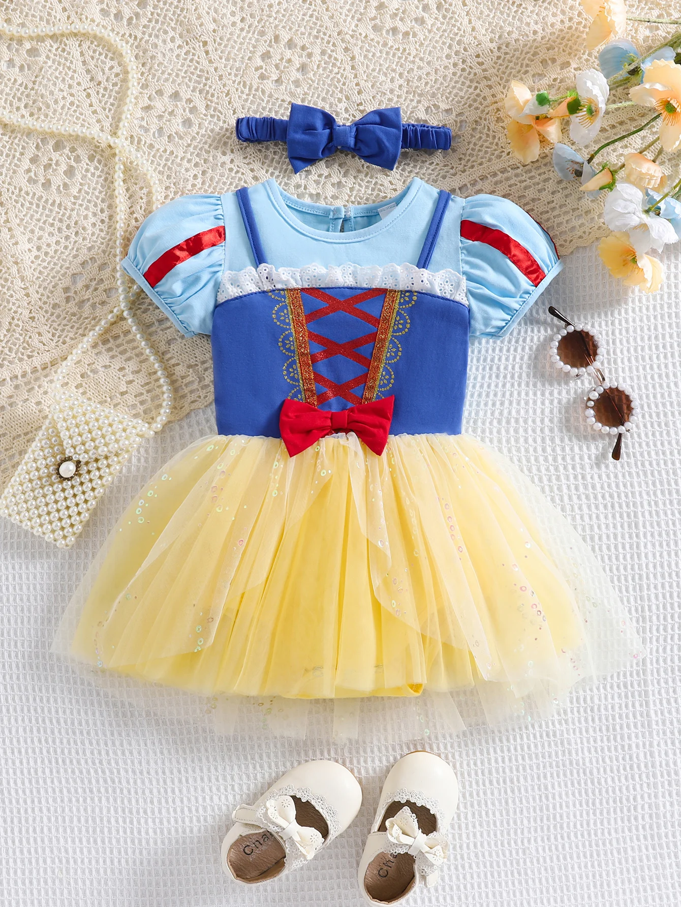 

Cute princess Tutu dress for girls with bubble sleeves and matching bow headband suitable for birthdays and outdoor gatherings