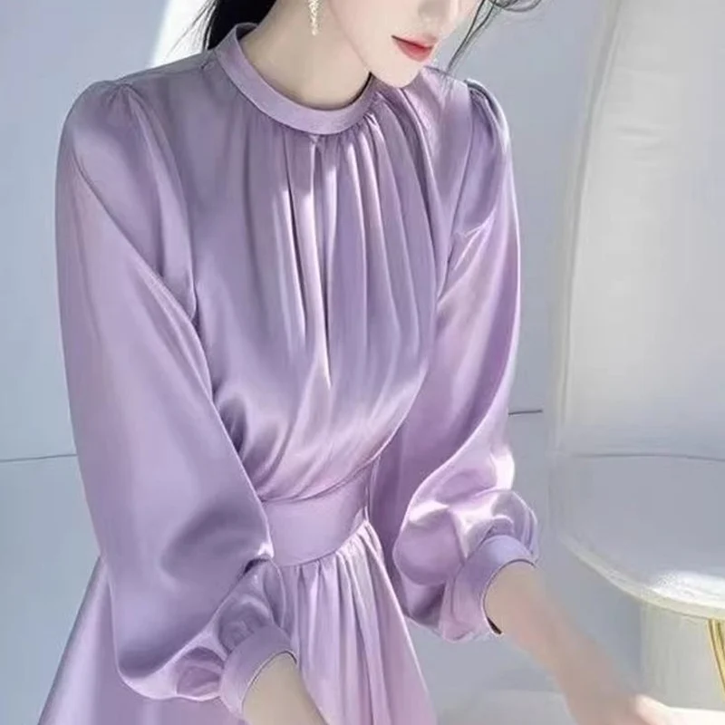 2025 printemps nouvelle simplicité élégante couleur unie col rond à manches longues Blouse dames à la mode Corset plissé femmes petit haut t-shirt