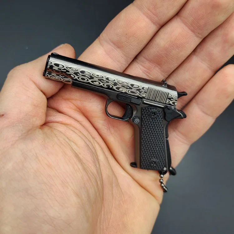 LLavero de pistola de Metal con estampado de Damasco, llavero de juguete con forma de arma de Metal 1911, modelo de pistola desmontable, 1: 3