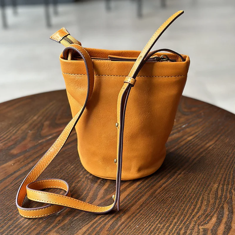 2023 New Top Layer Cowhide Small Bucket Bag for Women's One Shoulder Crossbody Mini Bag Retro Versatile Vegetable Tanned Leather