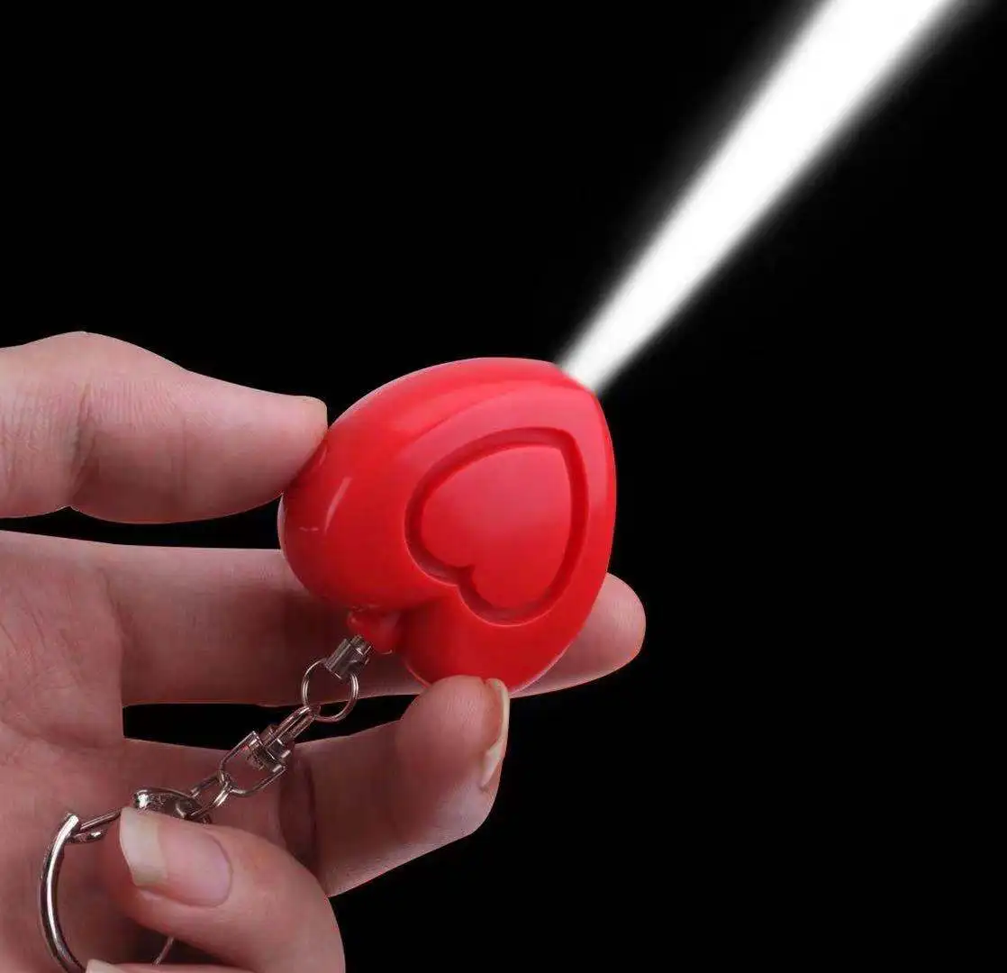 Small Personal Anti-Attack, with LED Light Coy Heart-Shaped Alarm and Alert Protection Keychain