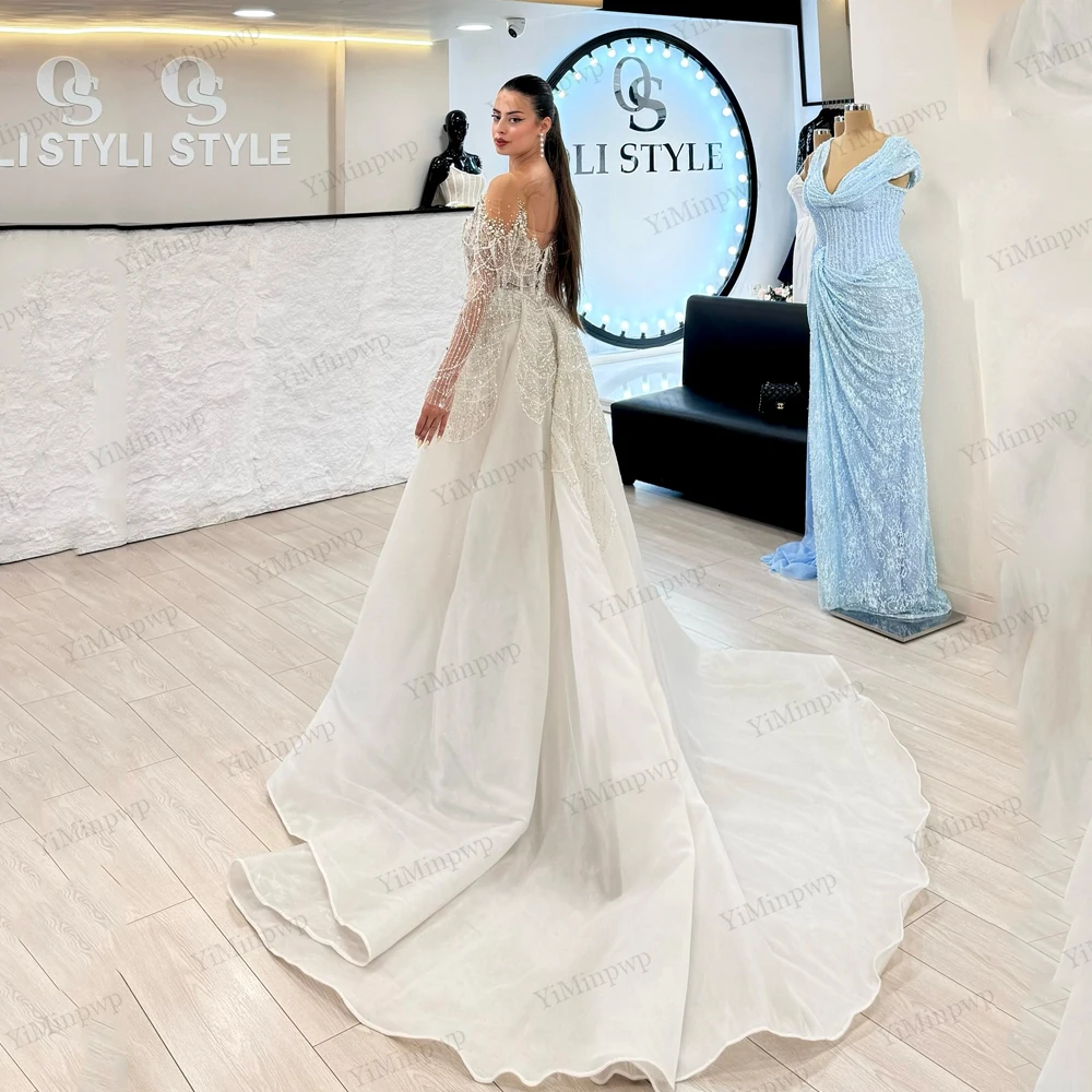 Vestidos de novia de sirena de lujo 2025 con tren desmontable, vestidos de novia con cuentas de cristales de manga larga, corsé con cuello redondo personalizado