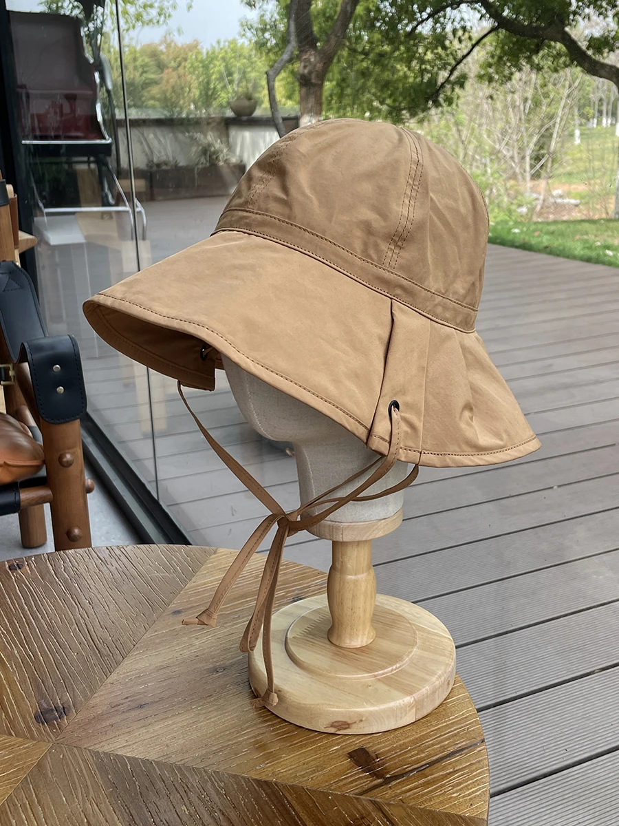 

Big brim bucket hat sunscreen strap basin hat outdoor sun hat women