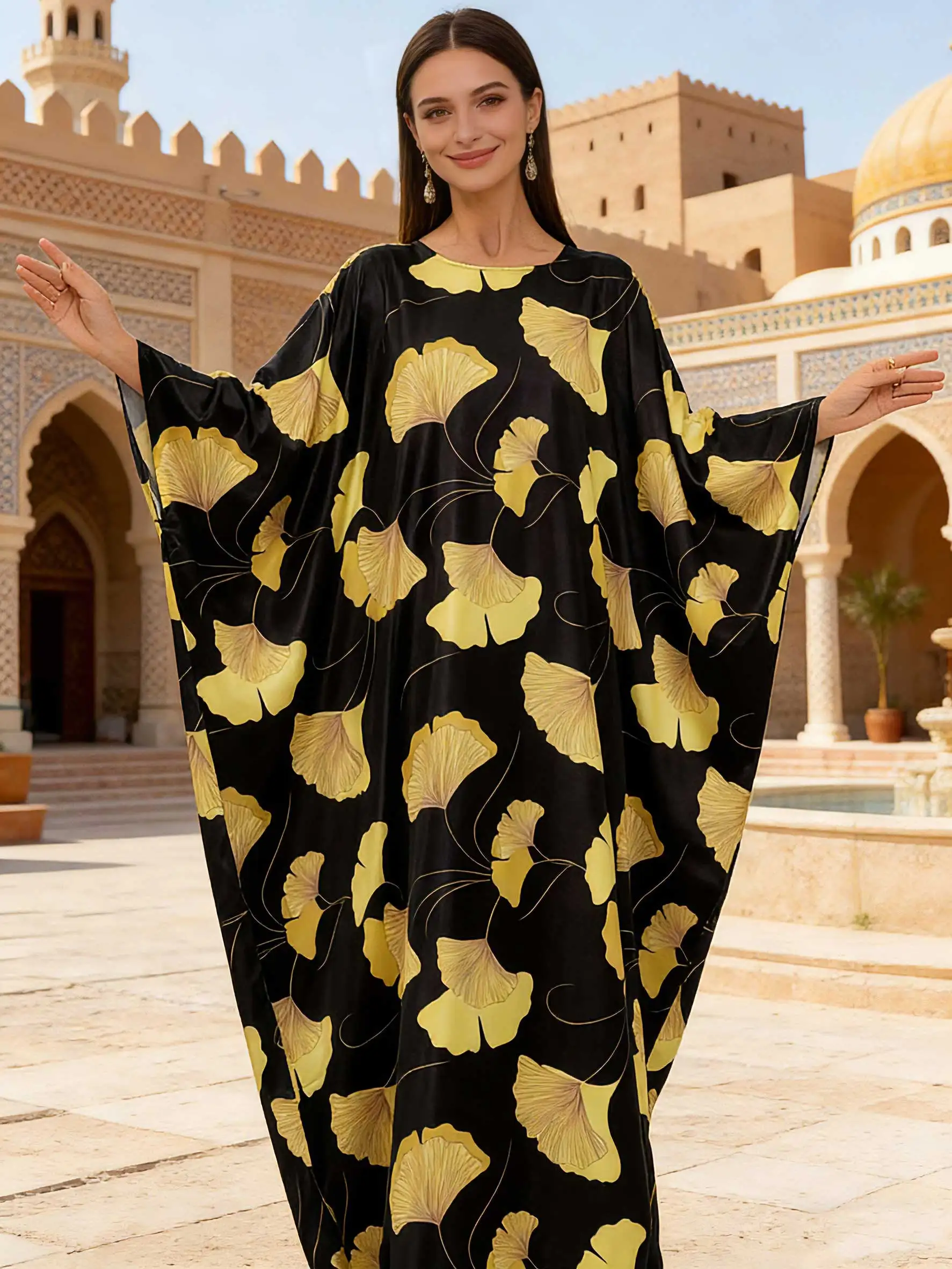 

Мусульманская абайя Рамадана 2026 года с ярким желтым листом гинкго Свободный крой. Предложение для скромного повседневного ношения или праздничного мероприятия.