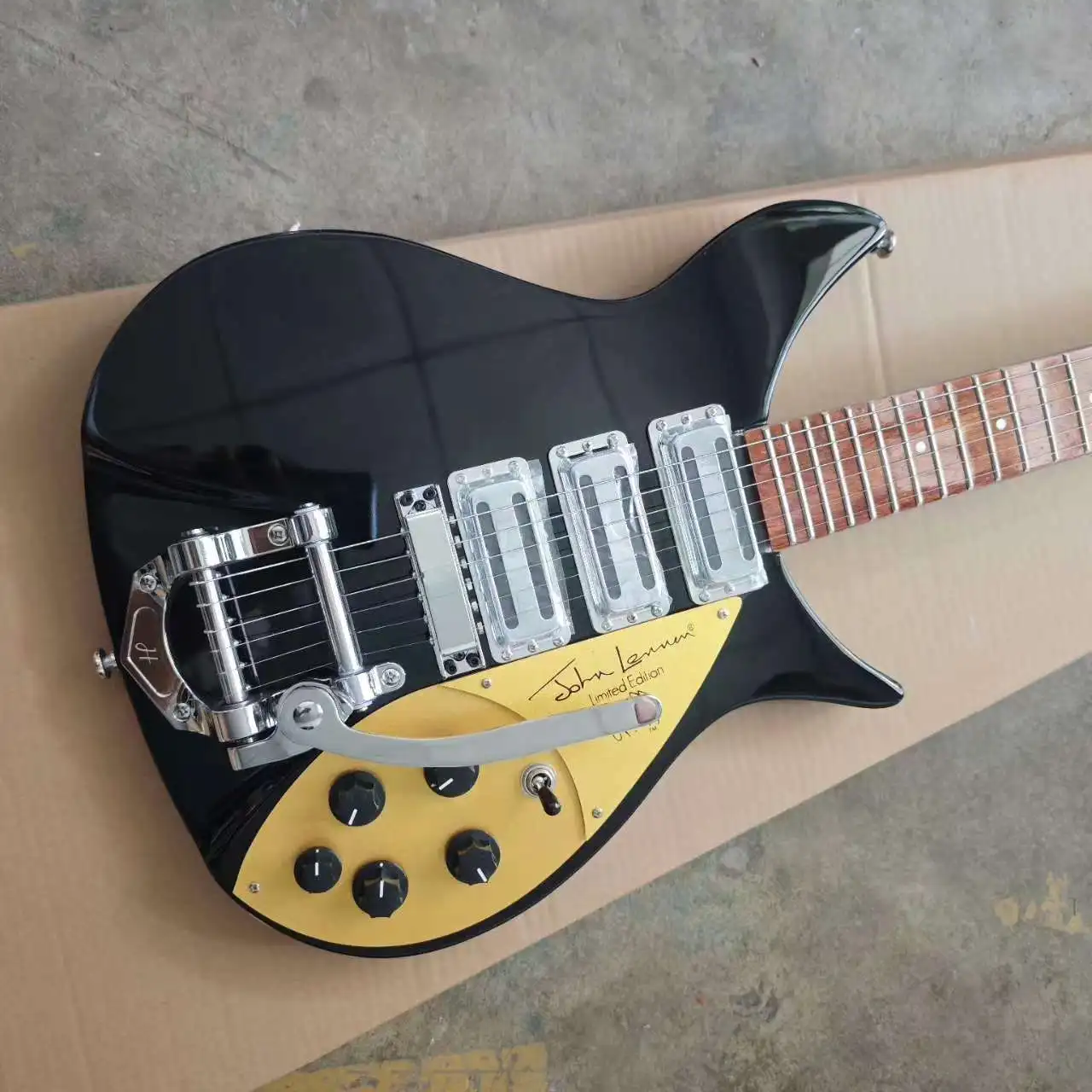 

Custom Black John Lennon-Inspired Electric Guitar with Small Tremolo,Bright Black Paint, Dot Inlay 6-String