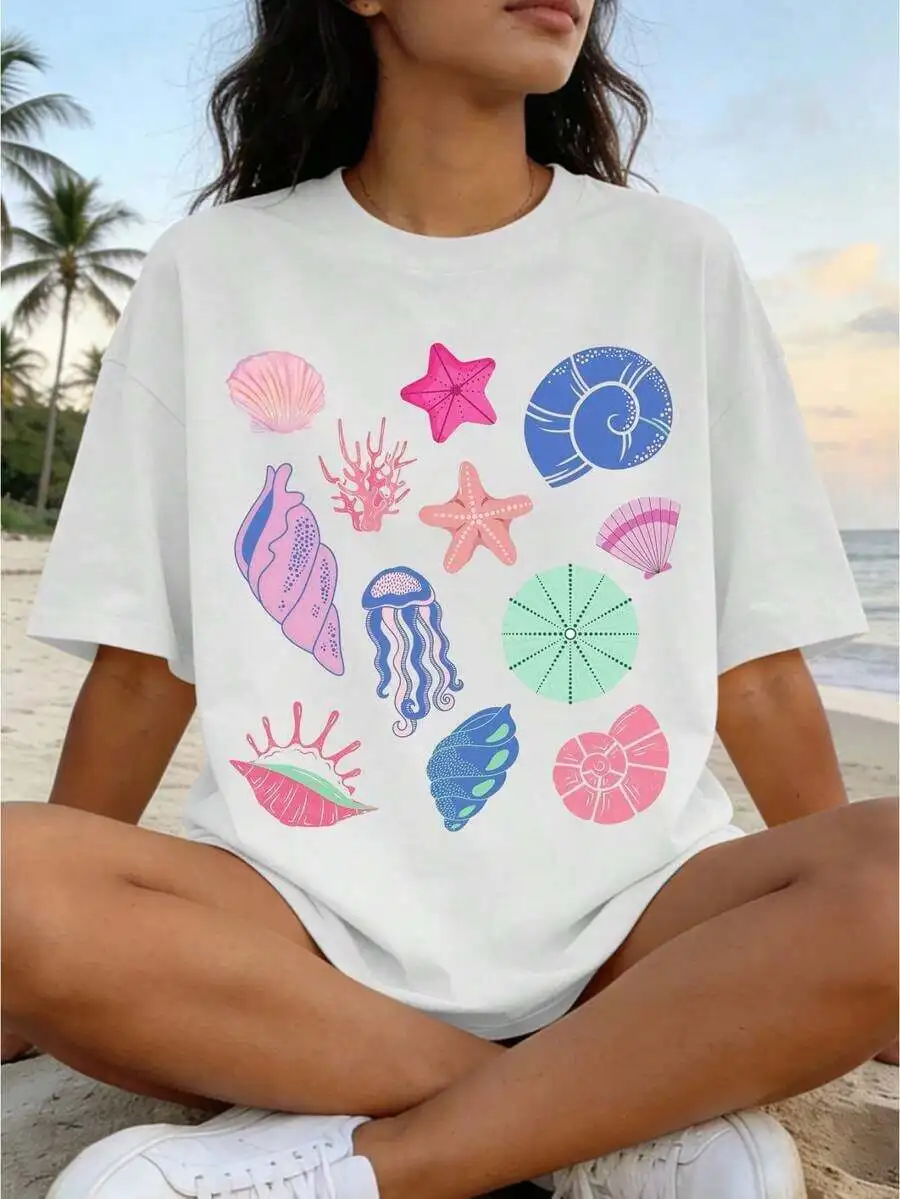 

Women Loose Fit Beach Vacation T-Shirt With Seashell Starfish Jellyfish Print Drop Shoulder Short Sleeve Round Neck Summer Top