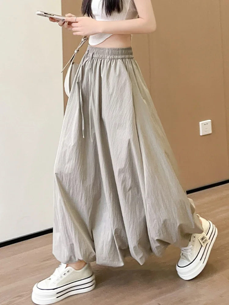 กระโปรงทรงเอไลน์ลายดอกไม้หวานๆ เอวยางยืดสูง รุ่นใหม่สำหรับฤดูร้อน กระโปรงยาวเรียบง่าย สไตล์อเนกประสงค์ ทรงกระโปรงทรงโคมไฟ