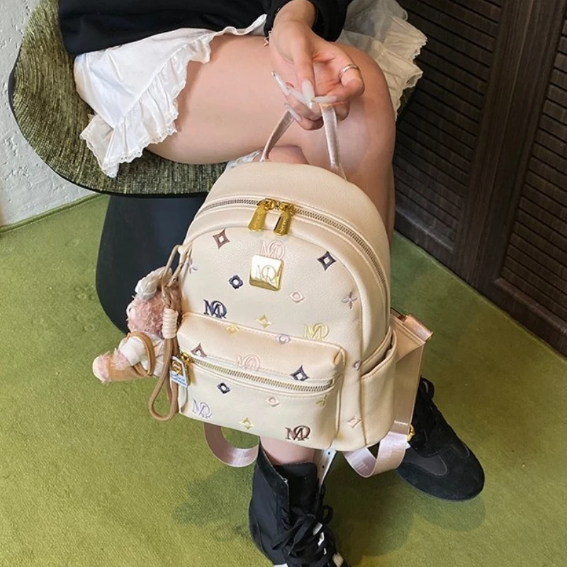 

Розовый женский рюкзак Xiaoduoduo 2025, новый стиль модного рюкзака большой вместимости с принтом и легкой дорожной сумкой