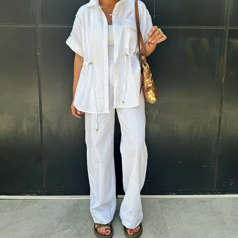 

2025 Лето Элегантный широкий костюм на пуговицах Повседневная рубашка с короткими рукавами и длинные брюки Женская мода с лацканами Однотонные свободные комплекты из 2 предметов
