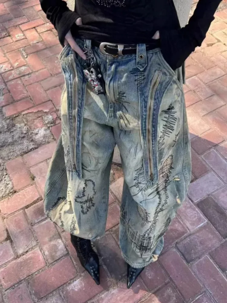 Amerikaanse retro gewassen denim jeans met noodlijdend en bedrukt ontwerp, losse en wijde pijpen streetwear broek voor dames