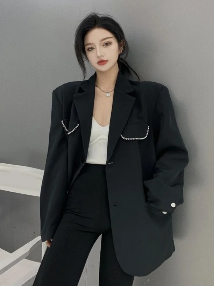 سترة نسائية سوداء اللون لربيع وخريف 2025 بتصميم عالي الجودة على الطراز الكوري سترة بدلة فضفاضة متوسطة الطول