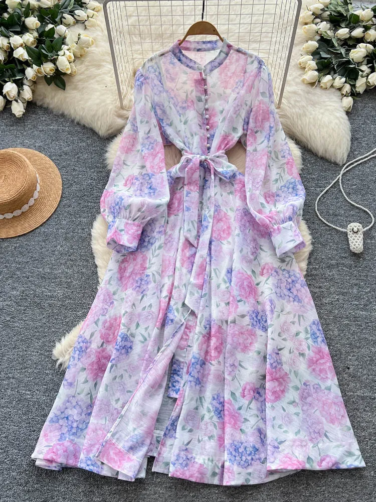 Długa spódnica damska z wiązaniem w talii, jesienna, w stylu dworskim, zapinana na jeden guzik, wyszczuplająca, z nadrukiem, o kroju litery A, z wysokim stanem, z włókna poliestrowego.