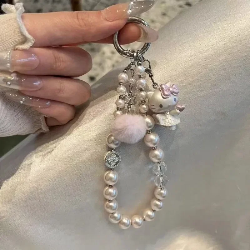Nouvelle mode rose boule de cheveux KT chat perlé téléphone portable pendentif mode douce fille coeur perle papillon Bracelet
